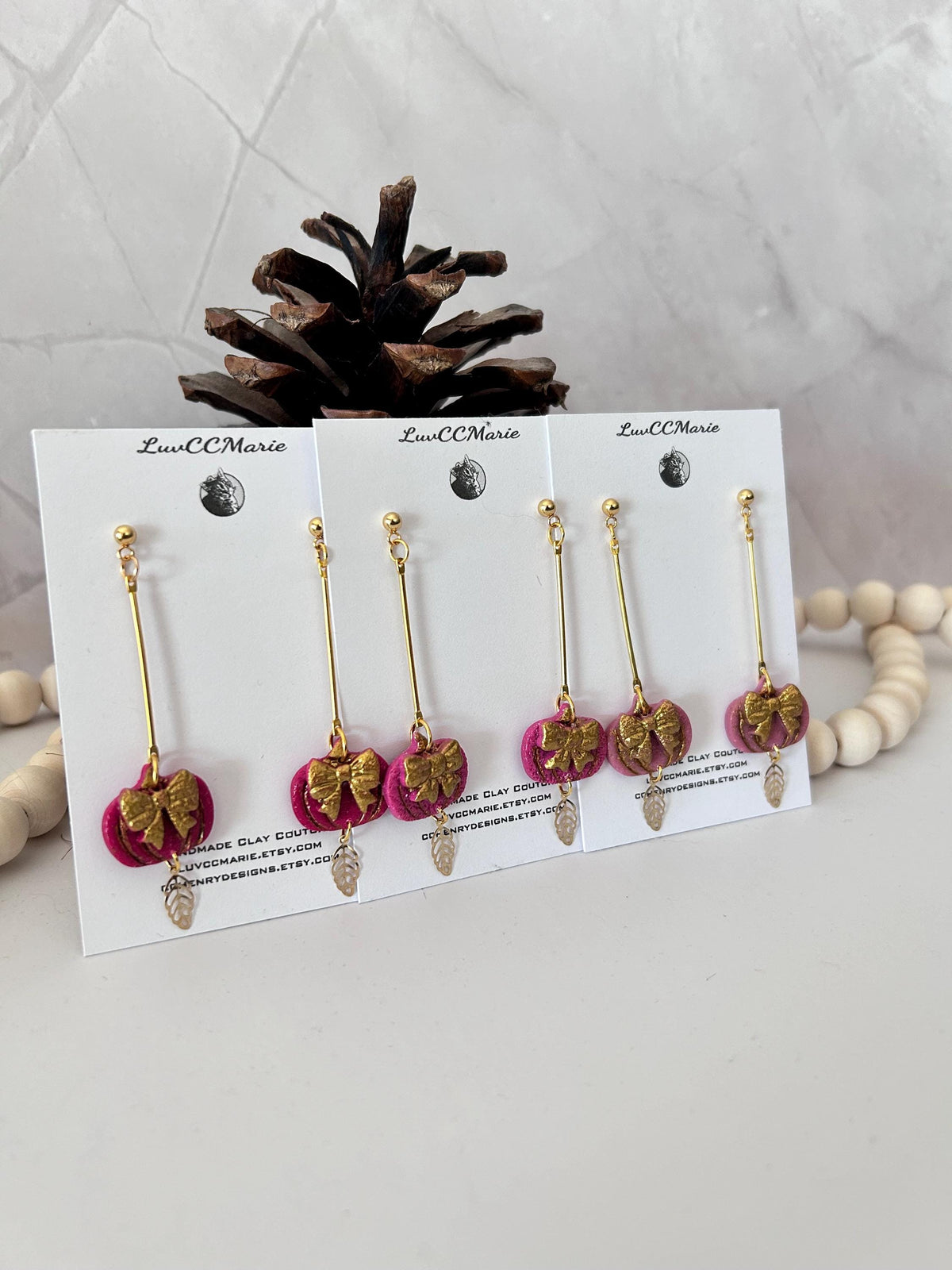 Handmade Pink Pumpkin Earrings: Gold Bow Clay Dangles