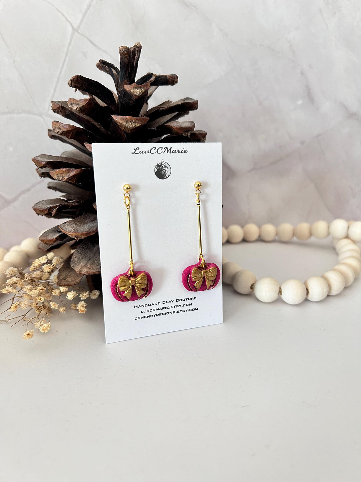 Handmade Pink Pumpkin Earrings: Gold Bow Clay Dangles