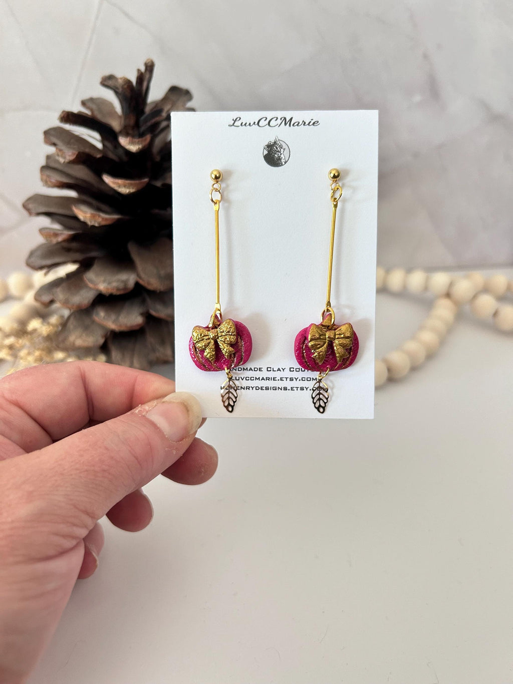 Handmade Pink Pumpkin Earrings: Gold Bow Clay Dangles