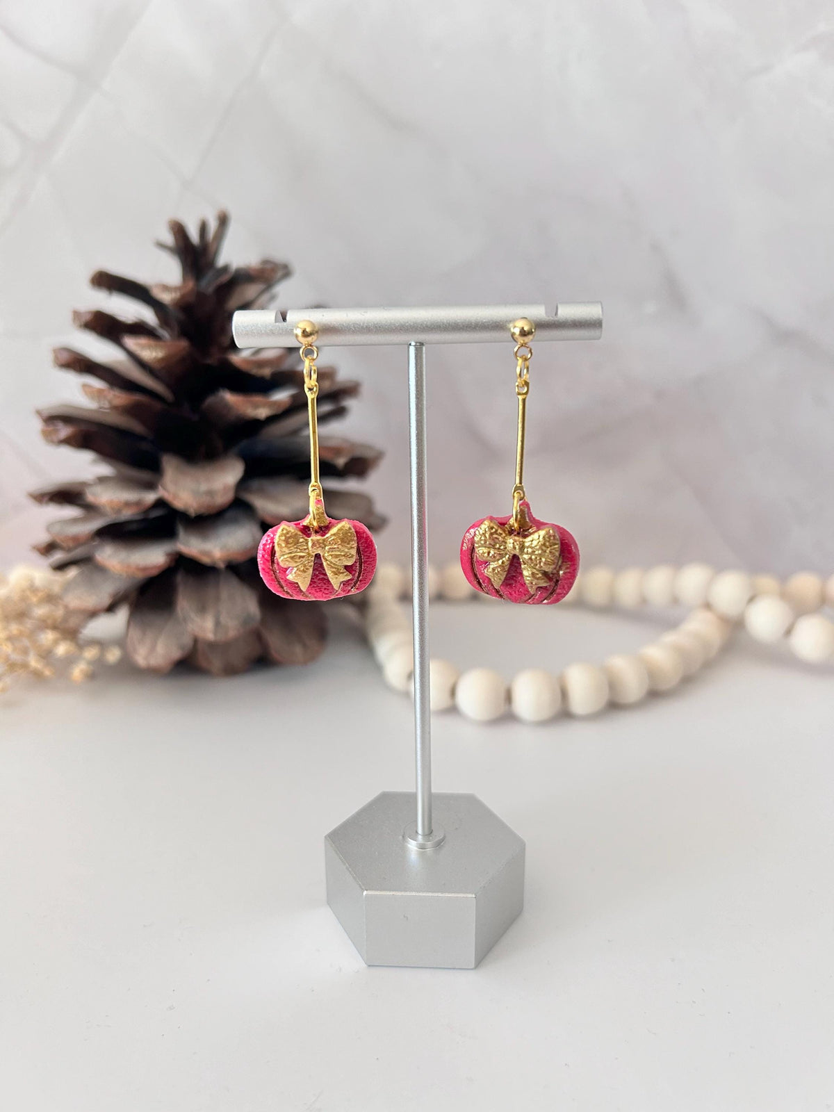 Handmade Pink Pumpkin Earrings: Gold Bow Clay Dangles