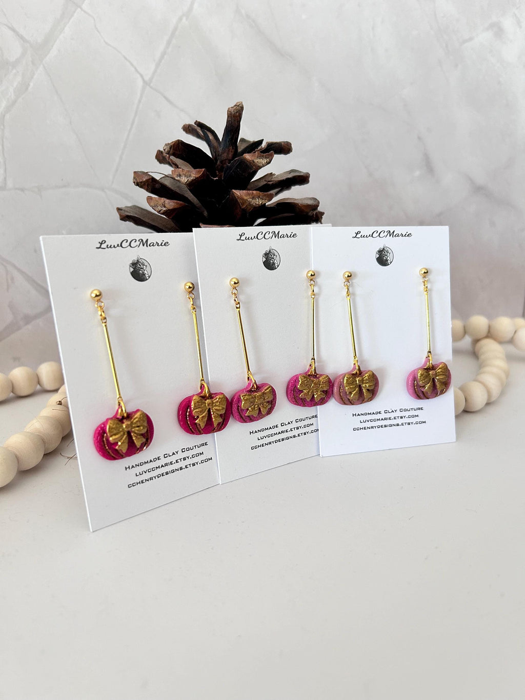 Handmade Pink Pumpkin Earrings: Gold Bow Clay Dangles