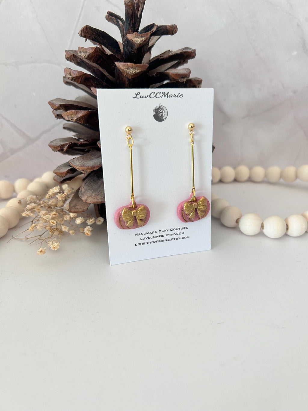 Handmade Pink Pumpkin Earrings: Gold Bow Clay Dangles